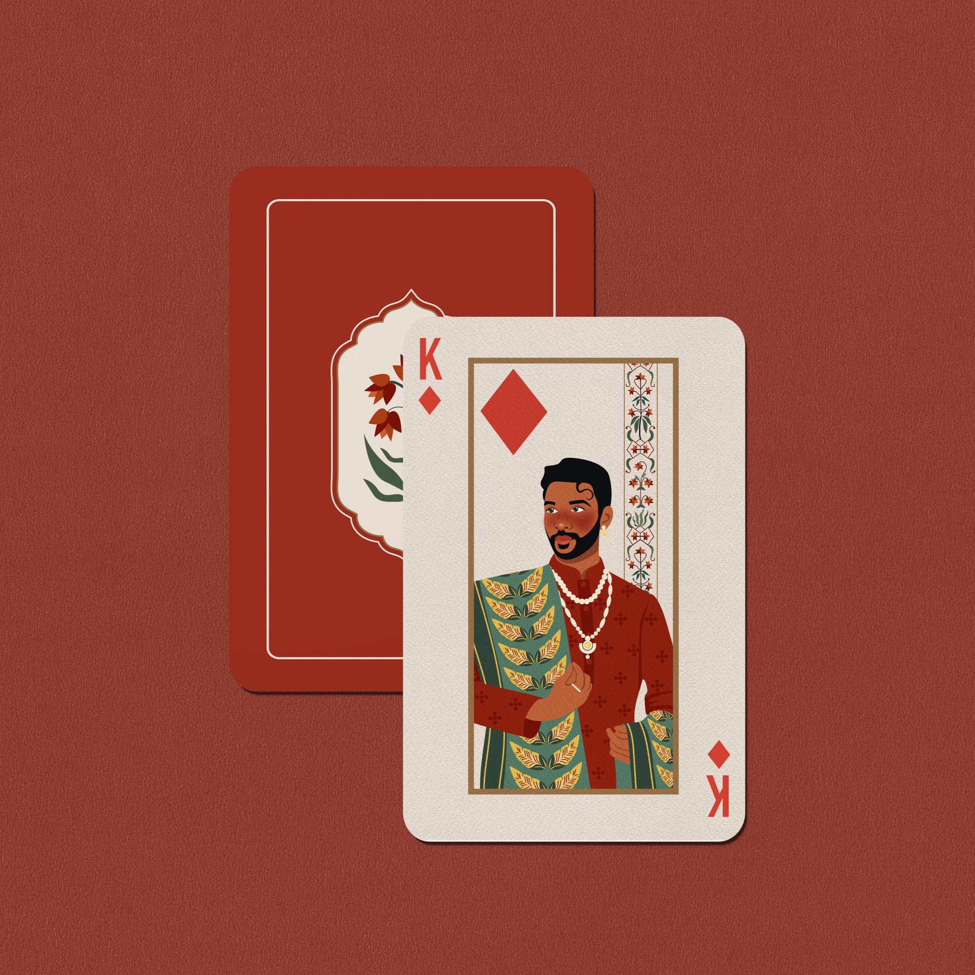 Playing card with a character design on a red background. A modern reimagining of a 1922 Indian deck, blending art, architecture, and history.